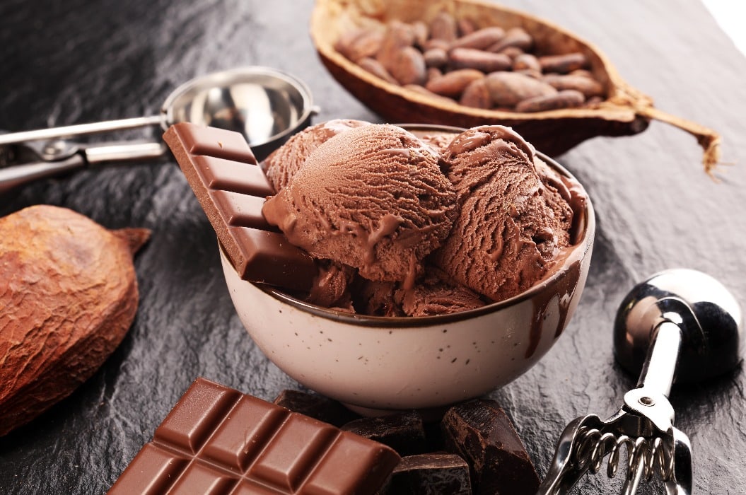 Chocolate coffee ice cream ball in a bowl. ice cream scoop